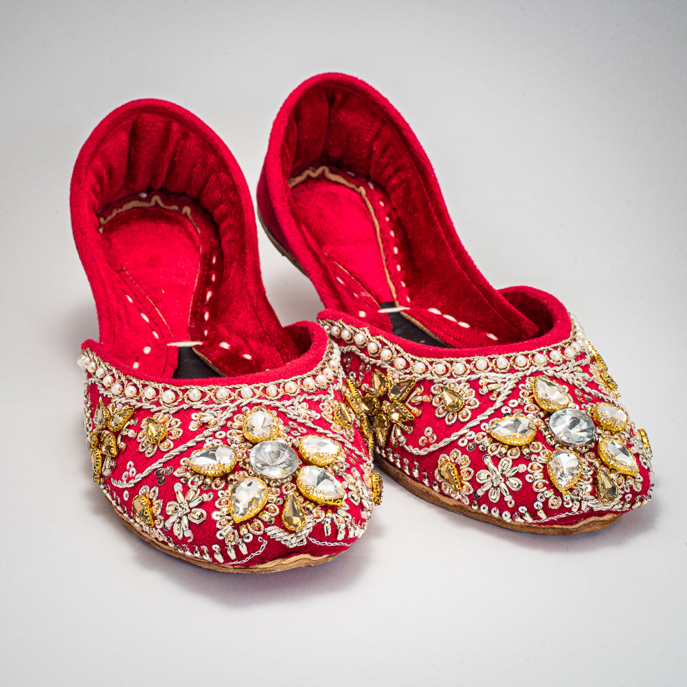Close-up of Behnaz velvet Khussa featuring intricate gold Zari and pearls