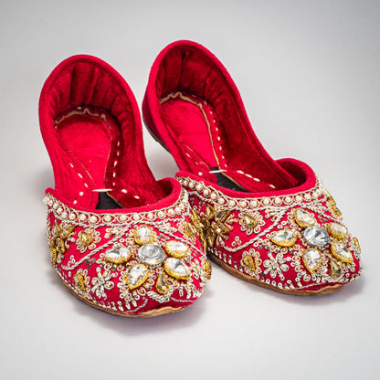 Close-up of Behnaz velvet Khussa featuring intricate gold Zari and pearls
