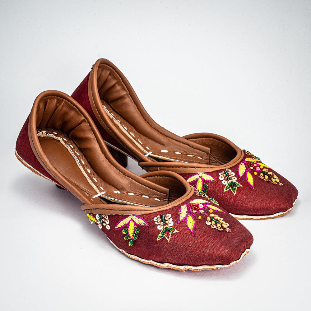 Side profile of Shaista handcrafted chappal showcasing intricate multicolored Zari work on bronze raw silk upper by Behnaz Pakistan