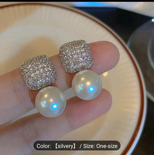 1 Pair of Luxury Women's Earrings.