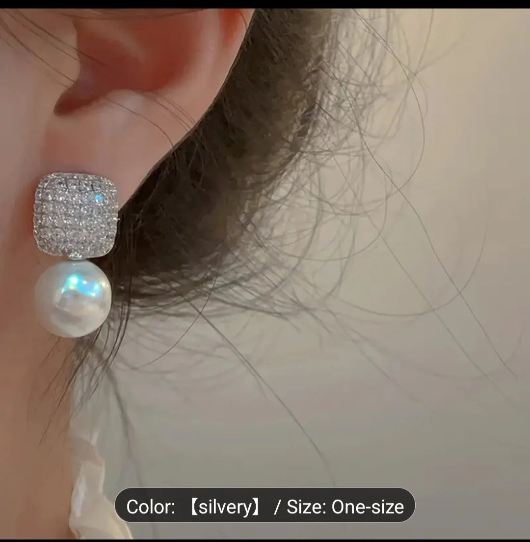 1 Pair of Luxury Women's Earrings.